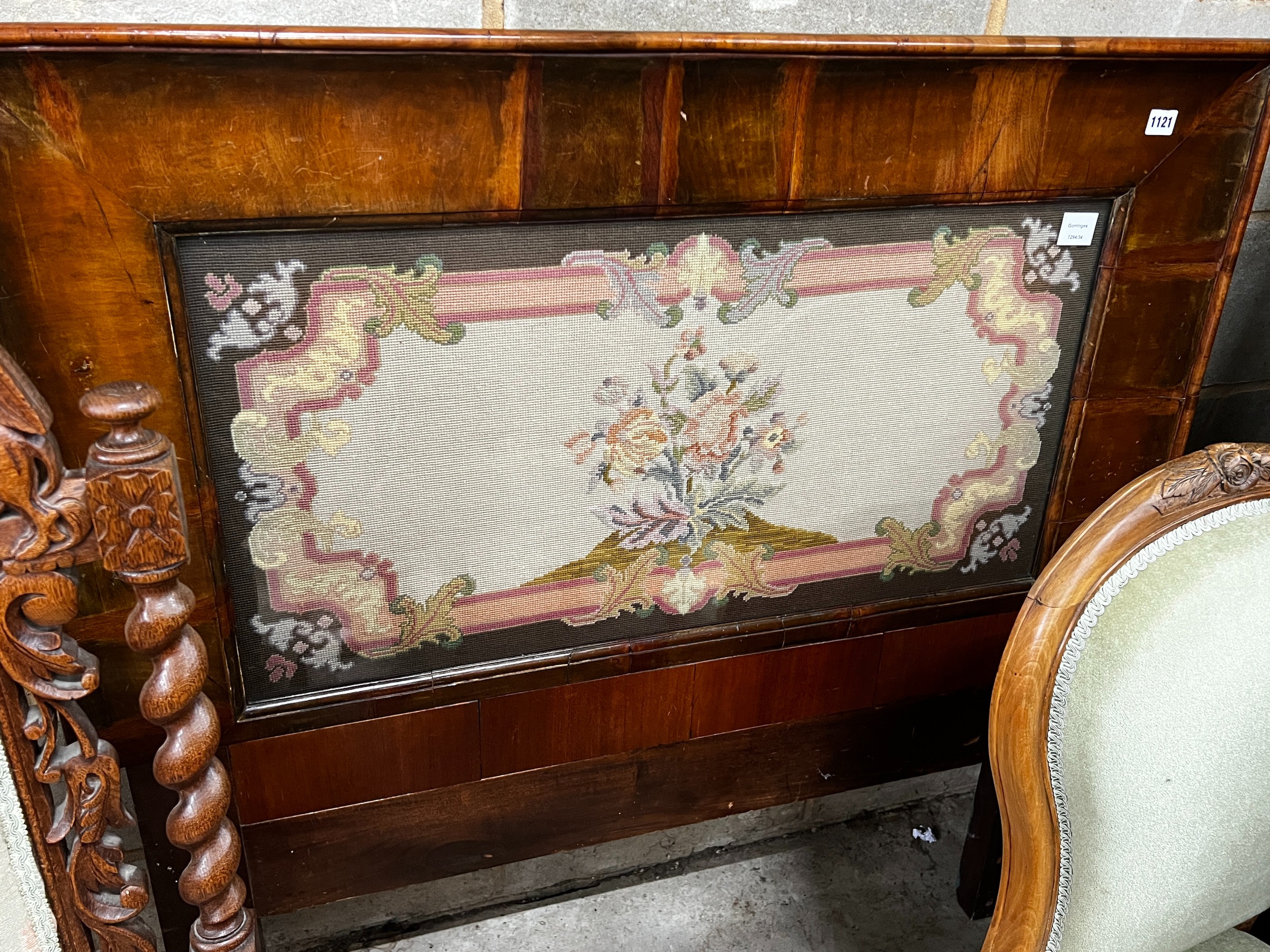 A Victorian rectangular walnut framed headboard with a floral tapestry panel, height 113cm